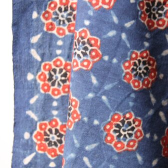 Warm red on cool indigo