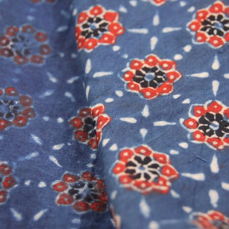 Warm red on cool indigo
